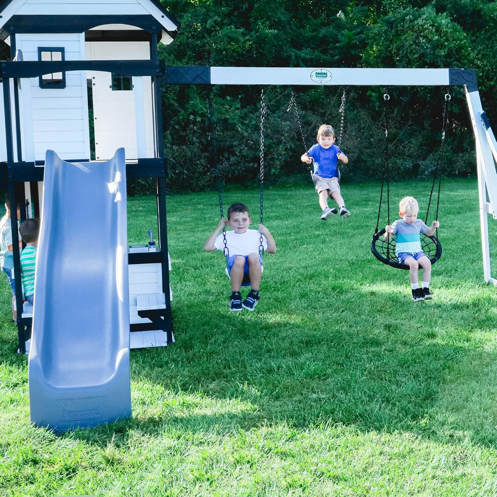 Backyard Discovery Canyon Creek Cedar Wood Swing Set with Wave Slide, Clubhouse, Play Kitchen, Picnic Area, Belt Swings, Web Swing, Rock Wall, Balconies, Playhouse, Step Ladder, Outdoor Playset